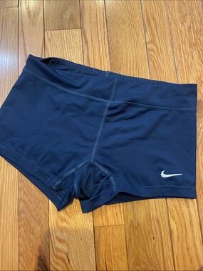 Nike Women's Navy Blue Athletic Volleyball Shorts with White Swoosh size small